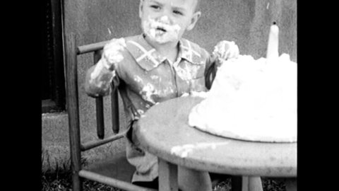 CIRCA 1930s - A baby celebrates his 1st birthday while the narrator hawks the camera it was shot on in 1938.