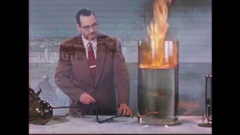 CIRCA 1950s - Scientists experiment with extinguishing contained fires and uncontained fires.