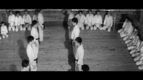 CIRCA 1961 - In this drama film, karate students engage in free fighting and demonstrate how to do karate from a seated position.