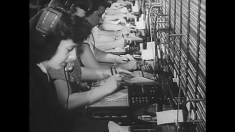 CIRCA 1950s - By using toll dialing, telephone operators are able to more quickly serve people who urgently need to place long distance calls in 1950.