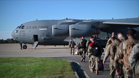 CIRCA 2020 U.S. Air Force airmen deploy on Boeing C-17 Globemaster III during COVID-19, Joint Base Langley Eustis, Virginia.