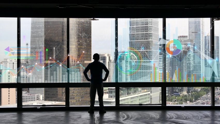 4k businessman back raising victory arm,Overlooking the urban from window.financial chart,Business tech digital Data trend hud Graph,Changing Economic node line,Digital Tableau of Stock Market Values. Royalty-Free Stock Footage #1064402461