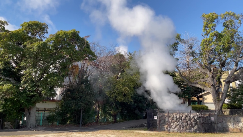 A park with steam rising from hot spring