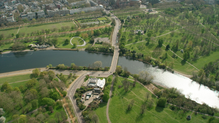 Aerial view of London Hyde Park and Diana Memorial Fountain no people travel tourism locations shutdown in Coronavirus pandemic enforced lockdown England UK Royalty-Free Stock Footage #1064440591