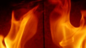 
Detail of wild burning flames in fireplace in Slow Motion HD VIDEO. Natural fire filling full frame of screen. Quarter speed. Close-up.
