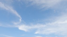 Fluffy puffy white cirrus or cirrostratus white cloud n cumulus cloudscape on beautiful sunny clear blue sky background in tropical summer or spring sunlight n sunray, 4k cinemagraphs b-roll TimeLapse