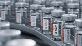 Production of COVID-19 vaccine. Sliding bottles on manufacturing line. 3D rendered looping animation. - Powered by Shutterstock - Get 15% off with code: PIKWIZARD15