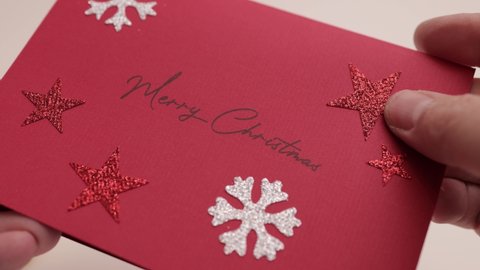 Merry Christmas Greeting Card with an Amazon Gift Card inside - FRANKFURT, GERMANY - DECEMBER 8, 2020