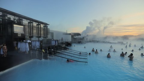 Blue Lagoon, Iceland. Nov. 2019. Iconic retreat spa with milky-blue shade water. People bathing in geothermal pools. High quality FullHD footage