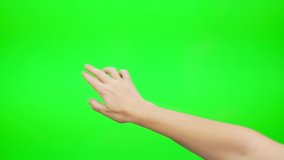 A Woman's Hand Touches, Slides, Drags and Runs Fingers on the Green Background Screen Chromakey. Alpha Channel. Using a Tablet, Laptop, Computer, or Touch Screen. - Powered by Shutterstock - Get 15% off with code: PIKWIZARD15
