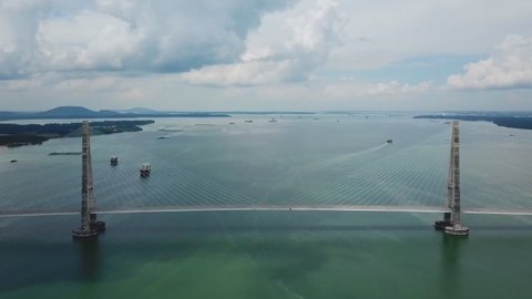 aerial view of the Sungai Johor Link Bridge , it is an expressway bridge across Johor River on Senai Desaru Expressway in Johor, Malaysia.