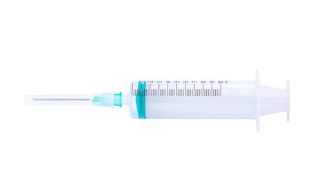 The pen draws the outline of the picture. Doodle video or Whiteboard Animation. Empty medical syringe isolated on white background