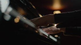 Female pianist plays In Grand Piano On Stage. Black background. Close Up hand. - Powered by Shutterstock - Get 15% off with code: PIKWIZARD15