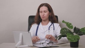 Point of View: Man Using Smartphone to Talk to His Doctor via Video Conference Medical App. Person Checks Symptoms, Talks with Physician, Using Online Video Chat Application