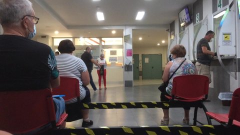 Hospital, waiting room, Latina- September 17: People sitting and waiting for clinical exams, Central Italy. September 17, 2020 in Latina, Central Italy.