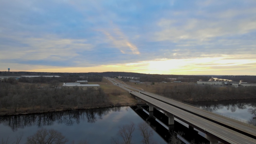 A bridge going over a wide river in Chippewa Falls, Wisconsin, USA