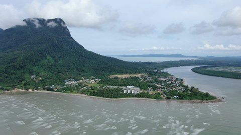 Buntal, Sarawak Malaysia - December 25, 2020: The Beautiful Fishing Village of Buntal at Sarawak Malaysia, beside the South China Sea, with the mighty Mount Santubong as the background