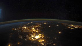 ISS Time-lapse Video of Earth seen from the International Space Station with dark sky and city lights at night over Mexico to Florida, Time Lapse Full HD. Images courtesy of NASA. Pan down motion.