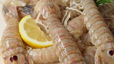 Fresh raw seafood mantis shrimps with lemon. seafood fish recipe 