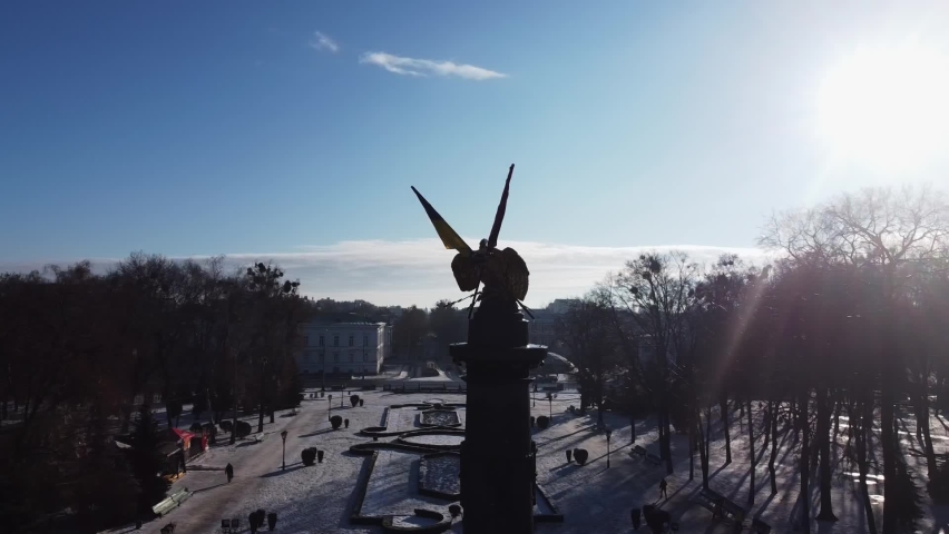 Aerial drone video fo glory statue of golden eagle in city centre of Poltava 