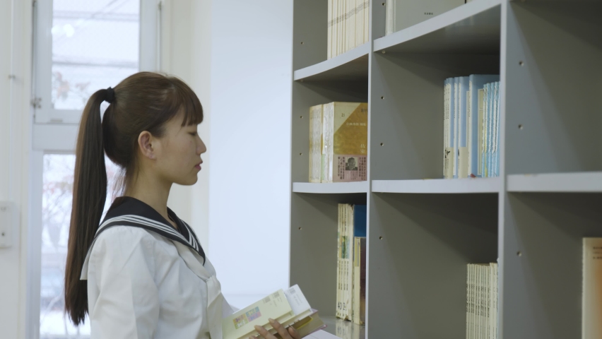 Young Japanese student studying in the classroom
