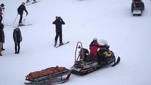 Bansko, Bulgaria - 15 Jan, 2020: Rescue snowmobile first aid on the ski slopes