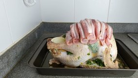 Closeup of a raw turkey being prepared for Holidays or a Celebration dinner.