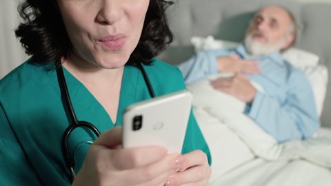 Nurse Texting On Phone Ignoring Coughing Stock Footage Video (100% ...