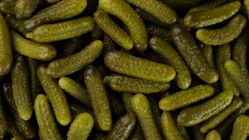 Pickled gherkins cucumbers top view rotation Royalty-Free Stock Footage #1064707363