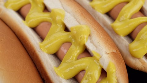 tasty hot dog with mustard close up. Classic hot dog with mustard