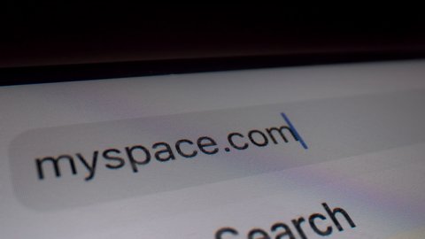 NOVOSIBIRSK, RUSSIA - NOVEMBER 15, 2020: Typing MySpace domain in browser bar - Macro