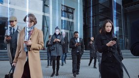 Successful Group of Interconnected Business People Walking Street using Smartphone Sending Data Up into the World Wide Connected Social Network. Diverse People Use Internet to do E-Business - Powered by Shutterstock - Get 15% off with code: PIKWIZARD15