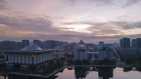 4K UHD Aerial Cinematic hyperlapse Footage view of Tuanku Mizan Mosque with Putrajaya administration background view during beautiful sunrise