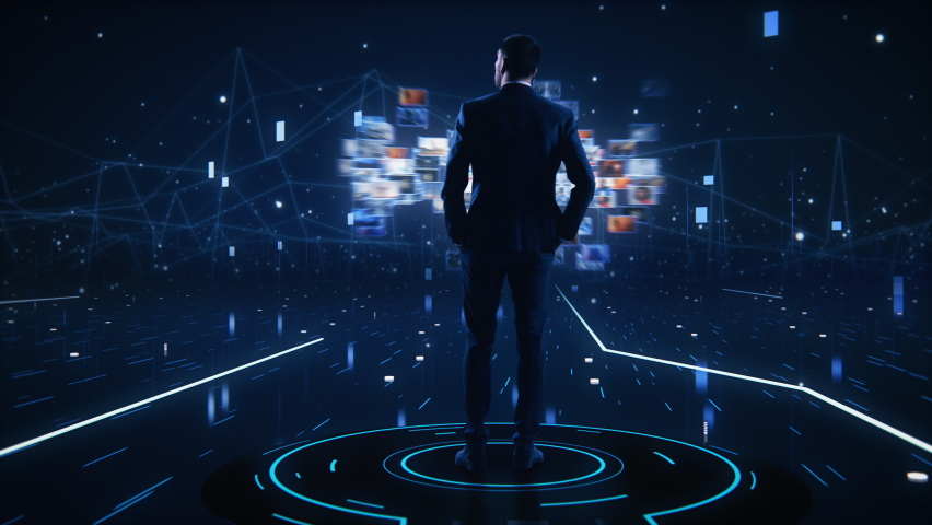 Virtual Reality Internet Interface Concept: Businessman Stands in 3D Cyberspace World: Browses Through Content Websites, Watches Video Streaming Services, uses Social Media, does e-Commerce e-Business | Shutterstock HD Video #1064718856