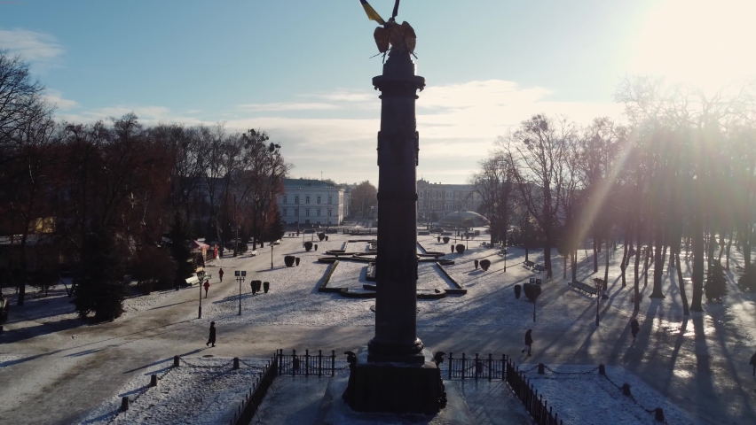 Aerial drone video fo glory statue of golden eagle in city centre of Poltava 