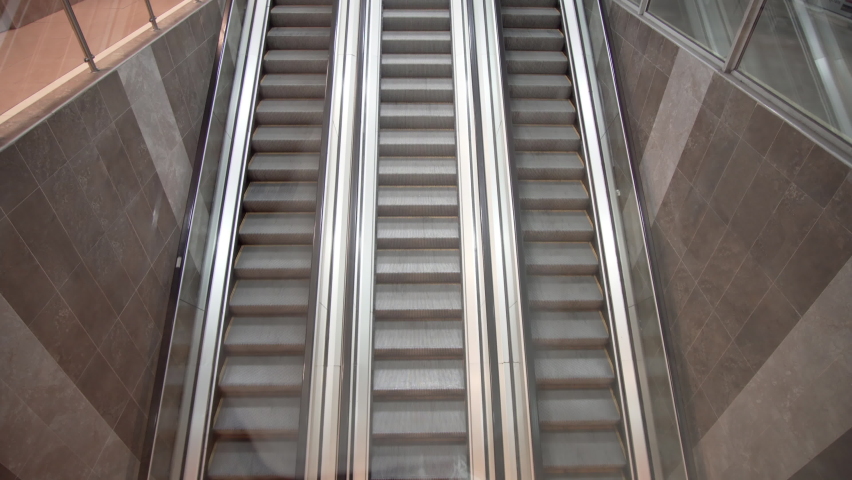 A panoramic angle of mooving escalator