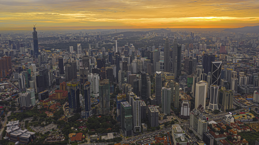 Kuala Lumpur Time Lapse: Sunset of cityscape during a golden sunset overlooking an elevated highway in Kuala Lumpur city. Malaysia. Cinematic. Golden hour. Prores 4K | Shutterstock HD Video #1064763178