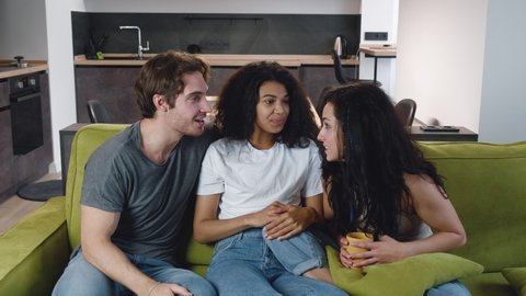 two brunette teens one guy