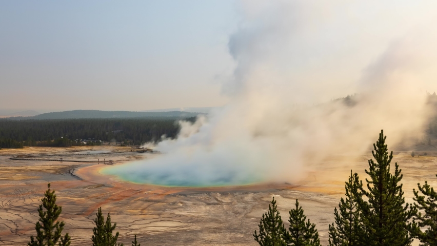 Time lapse of the steam rising from the Grand Prismatic Spring in Yellowstone National Park in Wyoming at dawn.