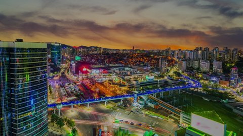 Time lapse 4k. Seoul Subway with traffic and Seoul City Skyline showing tower in the financial district during sunset in Seoul, South korea(zoom in)