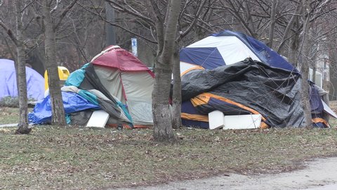Toronto, Ontario, Canada December 2020 Desperate homeless people sleep in park in COVID 19 pandemic recession in Toronto