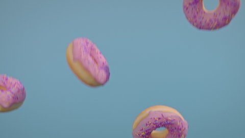 Pink frosting donuts on a blue background