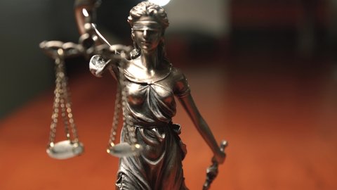 The Statue of Justice - lady justice  the Roman goddess of Justice in lawyer office
