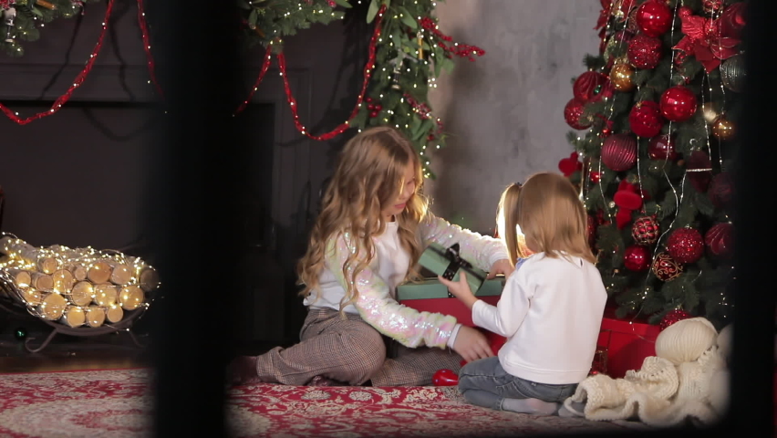 A child girl presses a New Year