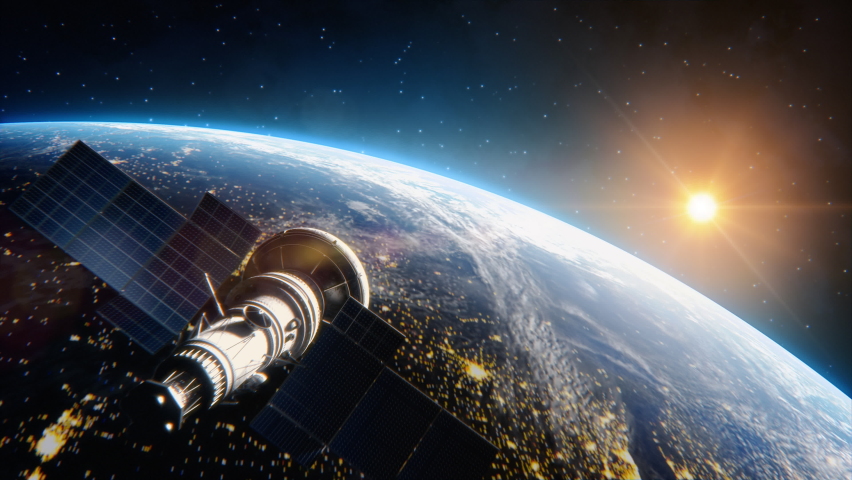 Breathtaking View of the Satellite Flying over Planet Earth as Seen from the Space. Rising Sun Illuminates Beautiful Planet, City Lights. Scientifically Accurate Advanced Technology. 3D VFX Rendering Royalty-Free Stock Footage #1064809414