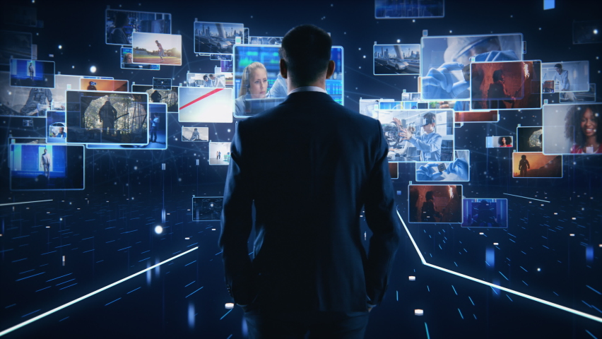 Virtual Reality Internet Interface Concept: Businessman Stands in 3D Cyberspace World: Browses Through Content Websites, Watches Video Streaming Services, uses Social Media, does e-Commerce e-Business | Shutterstock HD Video #1064809426