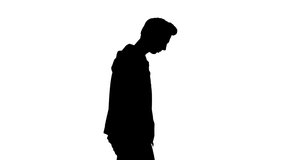 Silhouette Attractive casual young man walking.