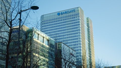 London, UK - December 17, 2020: One Churchill Place - the headquarters of Barclays Bank, London, England in 4K. Located in Docklands area of London Borough of Tower Hamlets in Canary Wharf. 