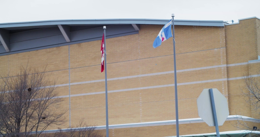 The Canadian and Toronto flat flapping in the wind