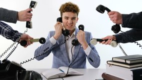 A lot of phone calls: Busy Angry assistant agent helper  working and answering a lot of calls at the same time, landline rotary phone. old school marketing or bad assistance concept - Powered by Shutterstock - Get 15% off with code: PIKWIZARD15